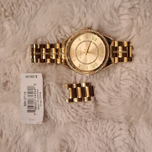Micheal kors gold watch, worn only 2 times , brand new condition